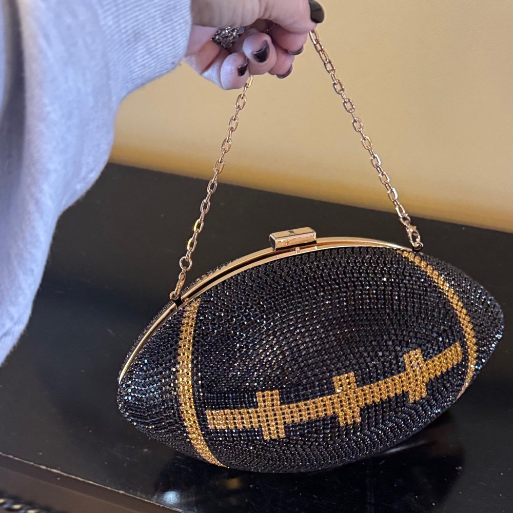 Glamorous Black and Gold Football Clutch